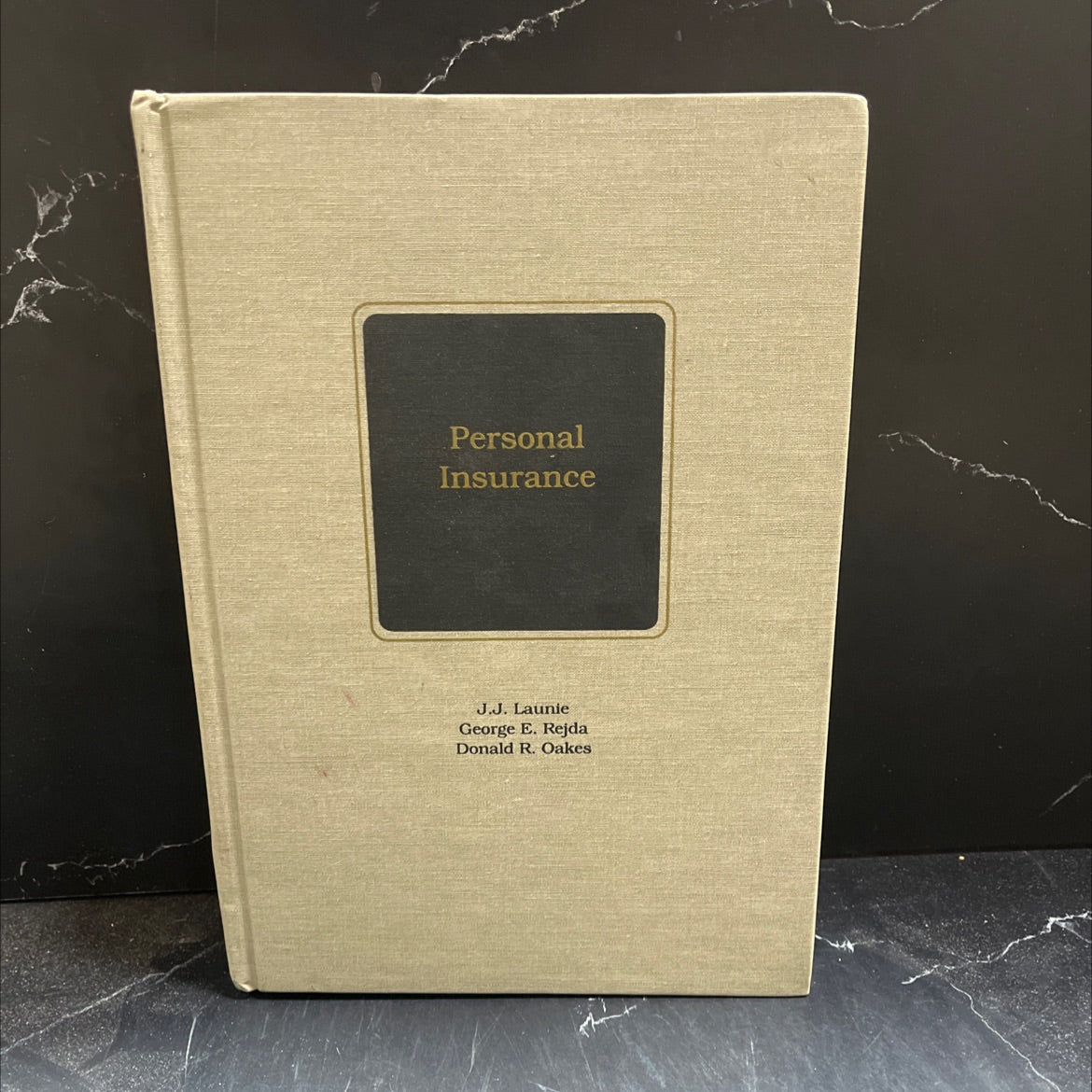 personal insurance book, by J.J. Launie, Ph.D., CPCU; George E. Rejda, Ph.D., CLU; Donald R. Oakes, CPCU, ARM, RHU;